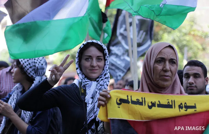 Palestinians take part in a protest as they mark Quds Day or Jerusalem Day in Gaza city, Friday, Aug. 02, 2013. The late Iranian leader Ayatollah Khomeni declared the last Friday of the Islamic fasting month of Ramadan a...
