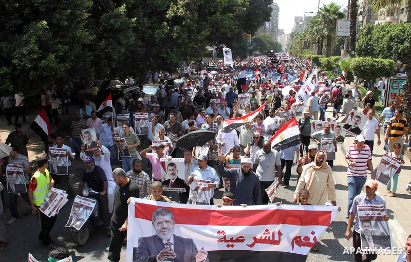 Supporters of ousted President Mohamed Morsi gather as they protest near Mustafa Mahmud street, after Friday prayer in Cairo, Egypt, 02 August 2013. Egyptian police on 01 August called on backers of ousted Islamist presi...