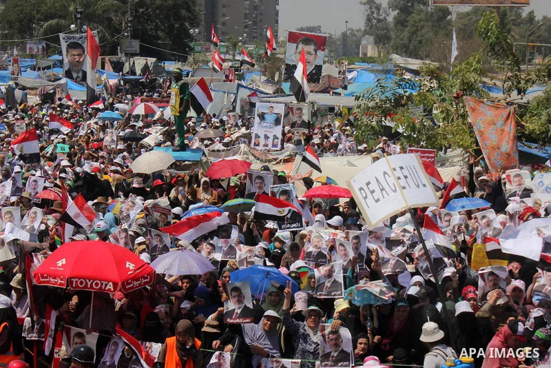 Supporters of ousted President Mohamed Morsi gather as they protest in a park in front of Cairo University, where protesters have installed their camp in Giza, southwest of Cairo, Egypt, 02 August 2013. Egyptian police o...