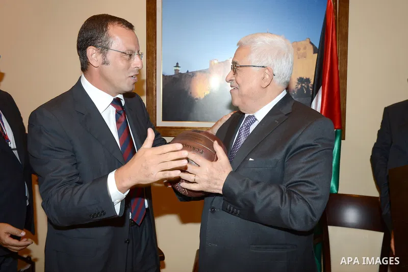 Palestinian President Mahmoud Abbas (Abu Mazen) meets with the Barcelona players in the West Bank city of Bethlehem, 03 August 2013. Photo by Thaer Ghanaim