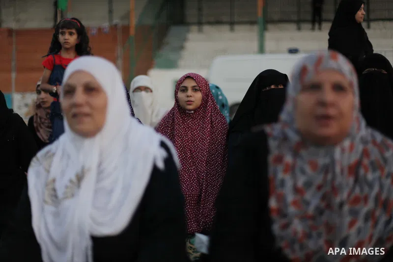 Palestinians attend the early morning Eid Al-Fitr prayer in the Gaza City on August 8, 2013. Muslims around the world are celebrating Eid al-Fitr this week, marking the end of holiest month of Ramadan during which follow...