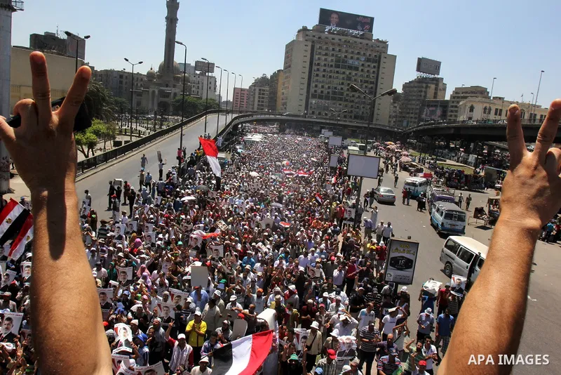 Supporters of ousted Egyptian President Mohammed Morsi take part in a demonstration in support of Morsi in Cairo, on August 9, 2013. Islamist supporters of deposed Egyptian president Mohamed Morsi planned new rallies as...