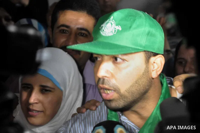A freed Palestinian prisoner, Samir Mortaga is welcomed upon his arrival near the Erez crossing, between Israel and Gaza in the Northern Gaza Strip. Israel released 26 long-held Palestinian prisoners in a planned goodwil...
