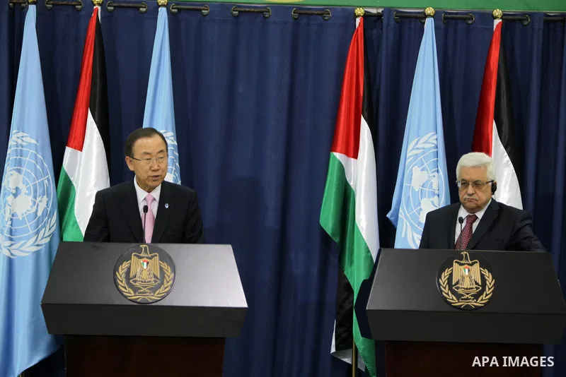 Palestinian President Mahmoud Abbas attends a joint press conference with UN Secretary-General Ban Ki-moon in the West Bank city of Ramallah on Aug. 15, 2013. Ban Ki-moon urged Israelis and Palestinians to have ''patienc...