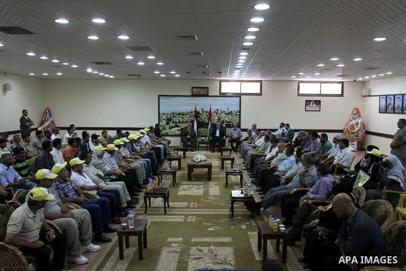 Palestinian Prime Minister in Gaza strip, Ismail Haniyeh, honors the prisoners released, in Gaza city on Aug. 19, 2013. Israel released 26 long-held Palestinian prisoners in a planned goodwill gesture hours ahead of a sc...