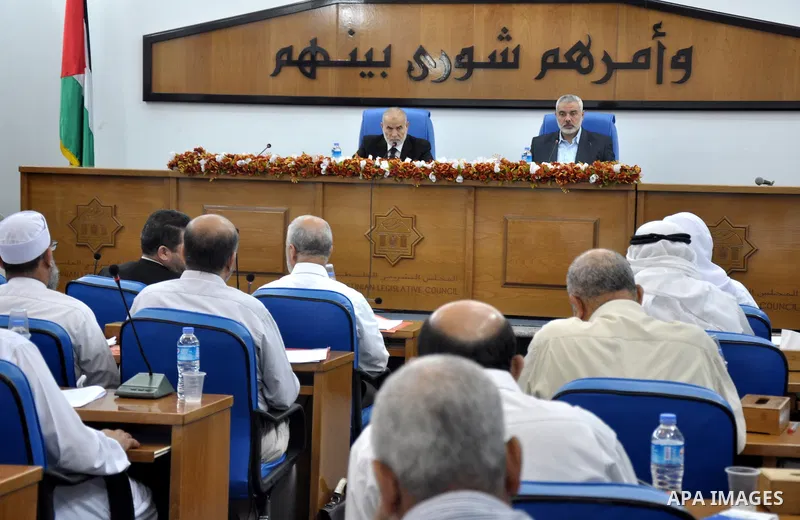 Palestinian Prime Minister in the Gaza Strip, Ismail Haniya meets with members of the Palestinian Legislative Council to discus the political situation in Egypt, in Gaza City on Aug. 20, 2013. Photo by Mohammed Talatene
