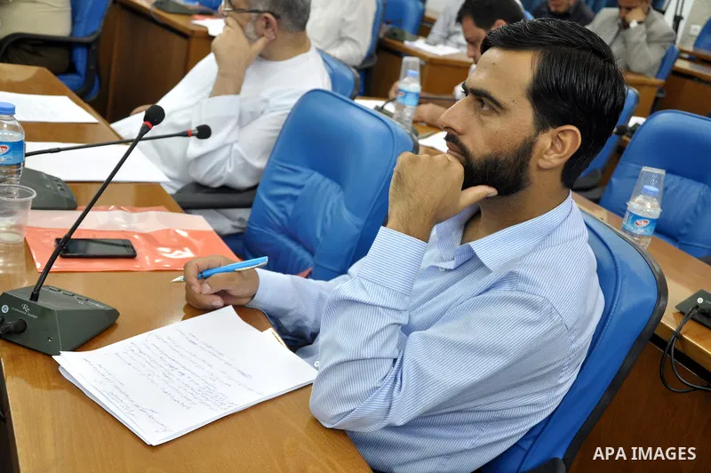 Palestinian members of the Legislative Council attend a meeting to discus the political situation in Egypt, in Gaza City on Aug. 20, 2013. Photo by Mohammed Talatene