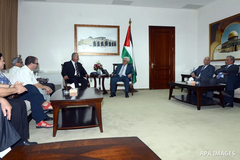 Palestinians President Mahmoud Abbas (Abu Mazen) meets with Mohammed Baraka in the West Bank city of Ramallah, on Aug. 19, 2013. Photo by Thaer Ganaim