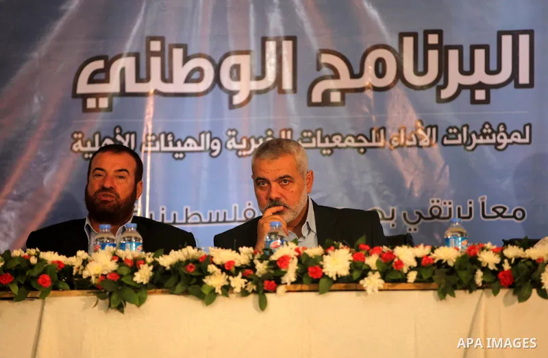 Palestinian Prime Minister in the Gaza Strip, Ismail Haniya, attends during the opening of the national program for the performance indicators for charity associations and community organizations, in Gaza city, on Aug. 2...