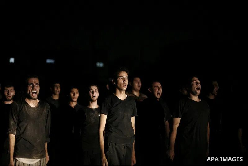 Palestinian youths take part in a night military-style exercises run by militants from the al-Nasser Brigades, an armed wing of the Popular Resistance Committees (PRC), at their training camp in Gaza City, Tuesday, Aug....