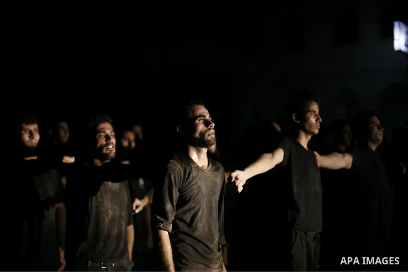 Palestinian youths take part in a night military-style exercises run by militants from the al-Nasser Brigades, an armed wing of the Popular Resistance Committees (PRC), at their training camp in Gaza City, Tuesday, Aug....
