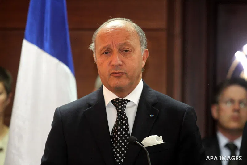 French Foreign Minister Laurent Fabius and Palestinian President Mahmoud Abbas (R) give a joint press conference after a meeting on August 24, 2013 in the West Bank city of Ramallah. Fabius visits Israel and the Palestin...