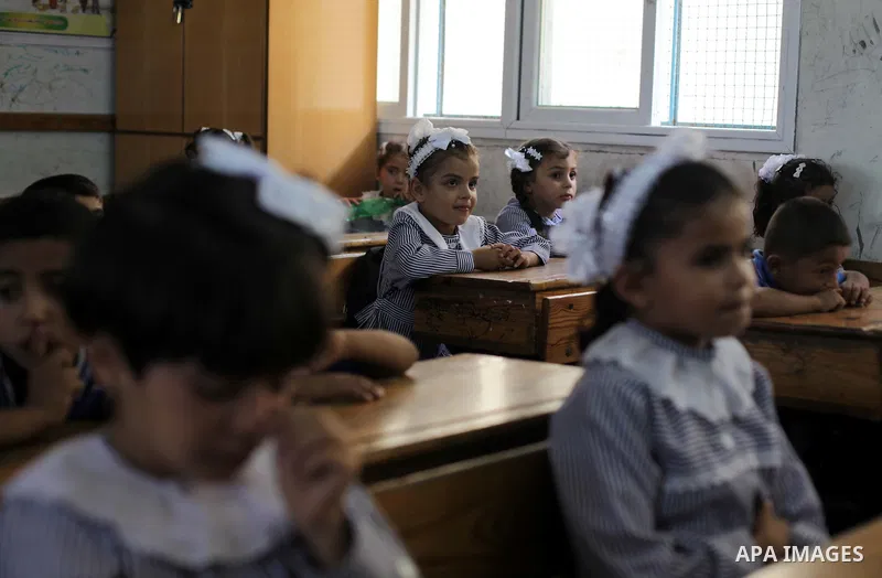 Palestinian school children attend a class at a U.N.-run school in Dir al-Balah in the central Gaza Strip, on the first day of the school year August 25, 2013. Photo by Ashraf Amra