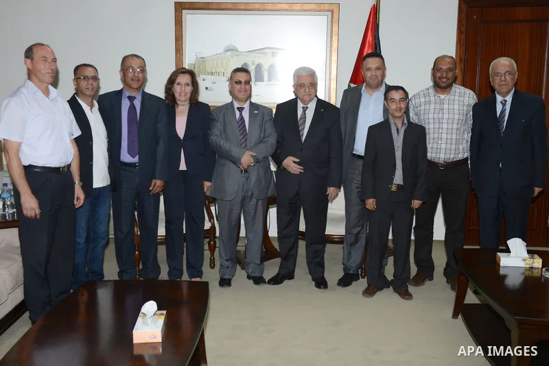 Palestinian President Mahmoud Abbas (Abu Mazen) meets with of the Palestinian Journalists Syndicate in the West Bank city of Ramallah on August 25, 2013. Photo by Thaer Ganaim