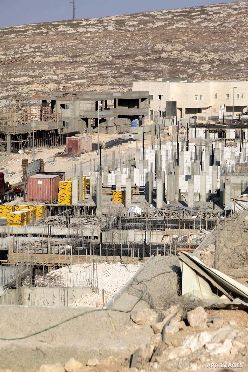 A picture shows the construction site in Pisgat Zeev, an urban settlement in an area Israel annexed to Jerusalem after capturing it in the 1967 Middle East war, near the Arab village of Beit Hanina, August 25, 2013. Pale...