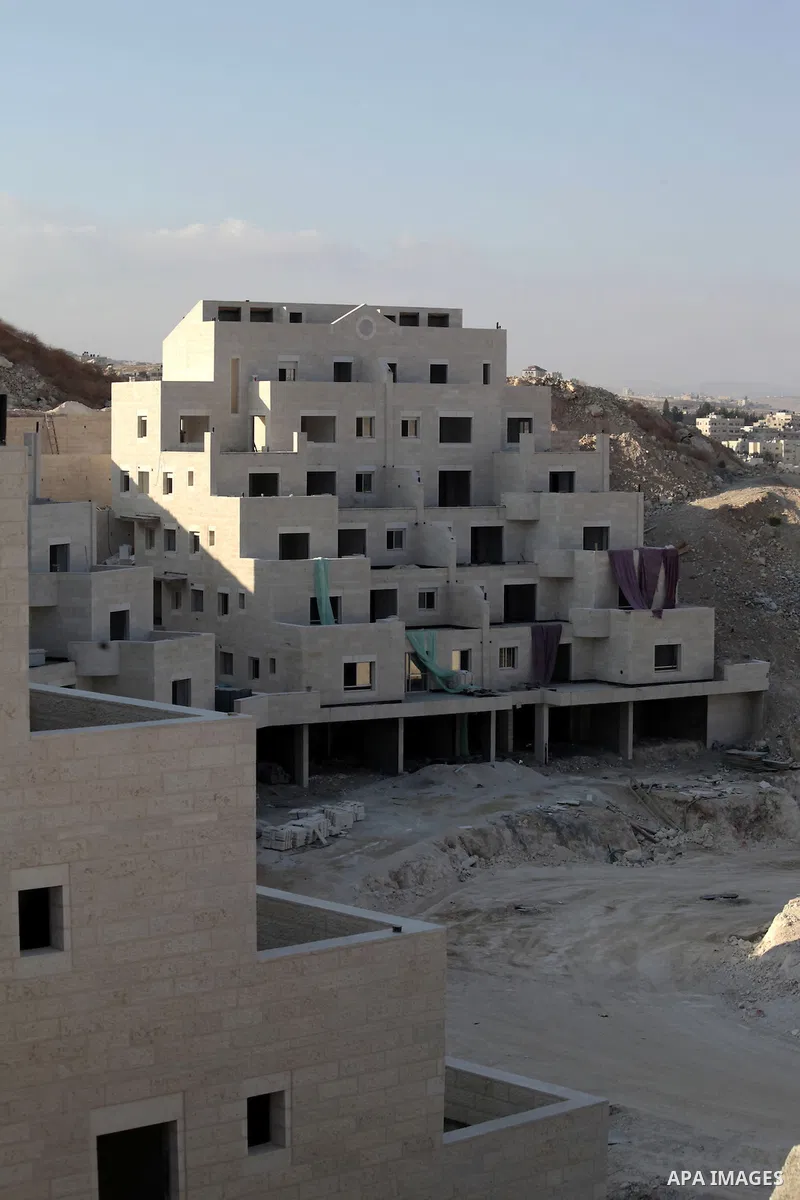 A picture shows the construction site in Pisgat Zeev, an urban settlement in an area Israel annexed to Jerusalem after capturing it in the 1967 Middle East war, near the Arab village of Beit Hanina, August 25, 2013. Pale...