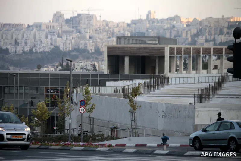 An ultra-Orhtodox Jewish man walks in Ramot, an urban settlement in an area Israel annexed to Jerusalem after capturing it in the 1967 Middle East war, August 25, 2013. Palestinian President Mahmoud Abbas last week reite...