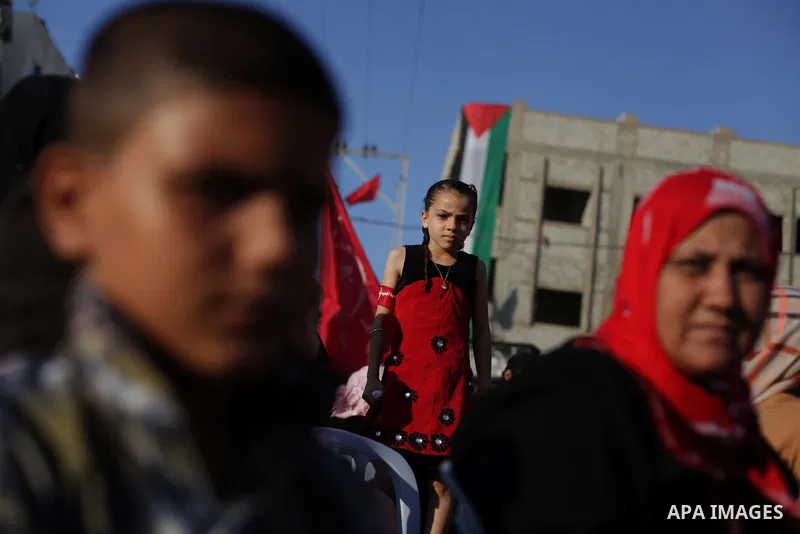 Palestinian supporters of Popular Front for the Liberation of Palestine (PFLP) take part in a rally marking the 12th anniversary of the killing of Abu Ali Mustafa, leader of (PLFP), in Gaza City August 27, 2013. Abu Must...
