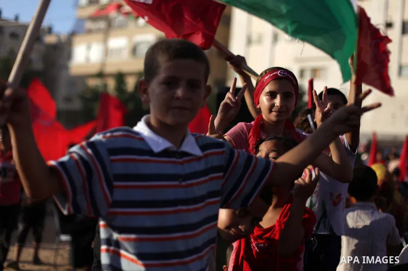 Palestinian supporters of Popular Front for the Liberation of Palestine (PFLP) take part in a rally marking the 12th anniversary of the killing of Abu Ali Mustafa, leader of (PLFP), in Gaza City August 27, 2013. Abu Must...