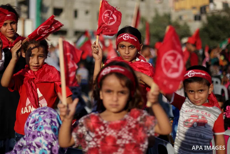 Palestinian supporters of Popular Front for the Liberation of Palestine (PFLP) take part in a rally marking the 12th anniversary of the killing of Abu Ali Mustafa, leader of (PLFP), in Gaza City August 27, 2013. Abu Must...
