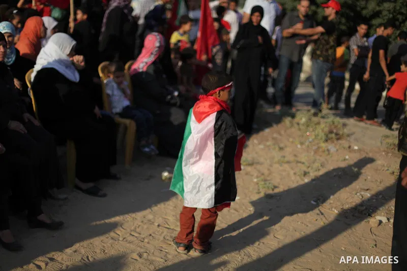 Palestinian supporters of Popular Front for the Liberation of Palestine (PFLP) take part in a rally marking the 12th anniversary of the killing of Abu Ali Mustafa, leader of (PLFP), in Gaza City August 27, 2013. Abu Must...