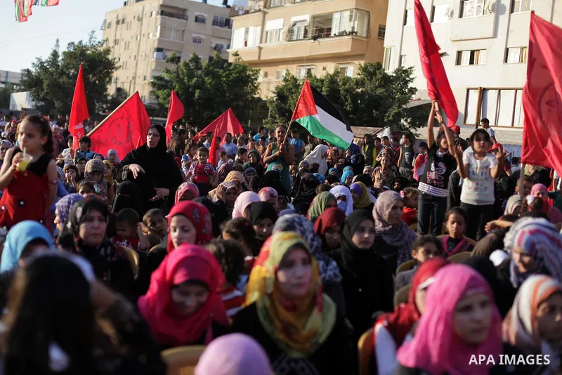 Palestinian supporters of Popular Front for the Liberation of Palestine (PFLP) take part in a rally marking the 12th anniversary of the killing of Abu Ali Mustafa, leader of (PLFP), in Gaza City August 27, 2013. Abu Must...