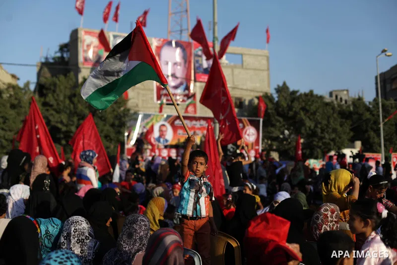 Palestinian supporters of Popular Front for the Liberation of Palestine (PFLP) take part in a rally marking the 12th anniversary of the killing of Abu Ali Mustafa, leader of (PLFP), in Gaza City August 27, 2013. Abu Must...
