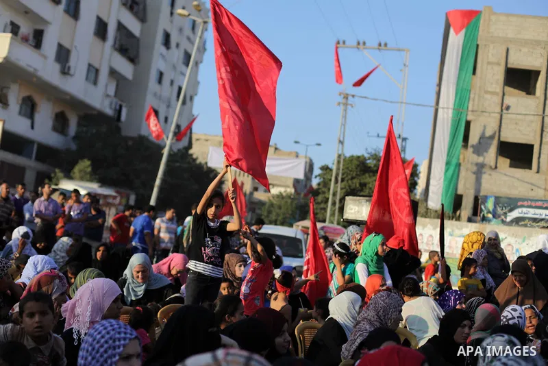 Palestinian supporters of Popular Front for the Liberation of Palestine (PFLP) take part in a rally marking the 12th anniversary of the killing of Abu Ali Mustafa, leader of (PLFP), in Gaza City August 27, 2013. Abu Must...