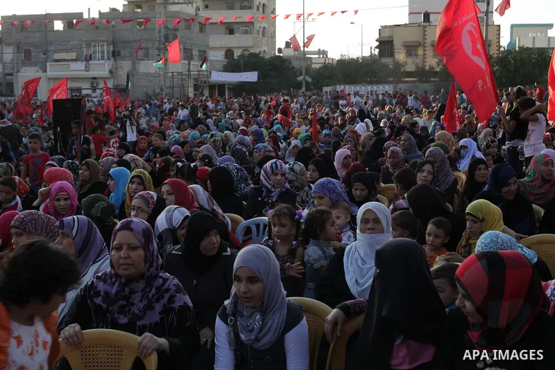 Palestinian supporters of Popular Front for the Liberation of Palestine (PFLP) take part in a rally marking the 12th anniversary of the killing of Abu Ali Mustafa, leader of (PLFP), in Gaza City August 27, 2013. Abu Must...