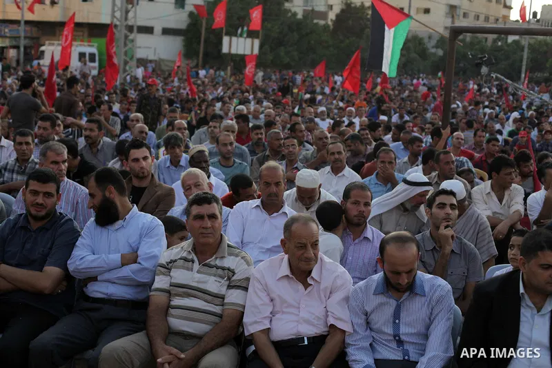 Palestinian supporters of Popular Front for the Liberation of Palestine (PFLP) take part in a rally marking the 12th anniversary of the killing of Abu Ali Mustafa, leader of (PLFP), in Gaza City August 27, 2013. Abu Must...
