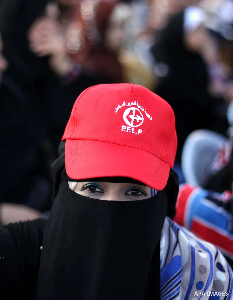 Palestinian supporters of Popular Front for the Liberation of Palestine (PFLP) take part in a rally marking the 12th anniversary of the killing of Abu Ali Mustafa, leader of (PLFP), in Gaza City August 27, 2013. Abu Must...
