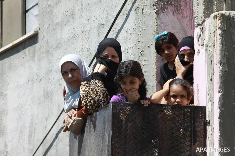 Palestinians carry the body of Kareem Abo Sbeih during his funeral in the Jenin refugee camp, near the West Bank city of Jenin August 31, 2013. Abo Sbeih died from his wounds on Saturday after Israeli soldiers shot dead...