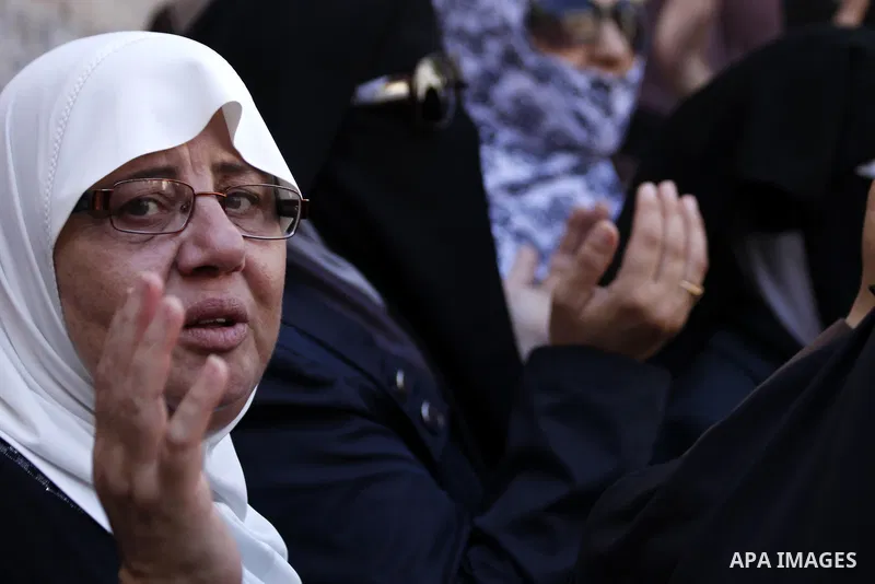 Palestinian women protest in Jerusalem's Old City, as minor clashes take place at a nearby compound known to Muslims as Noble Sanctuary and to Jews as Temple Mount September 4, 2013. An Israeli police spokesperson said f...