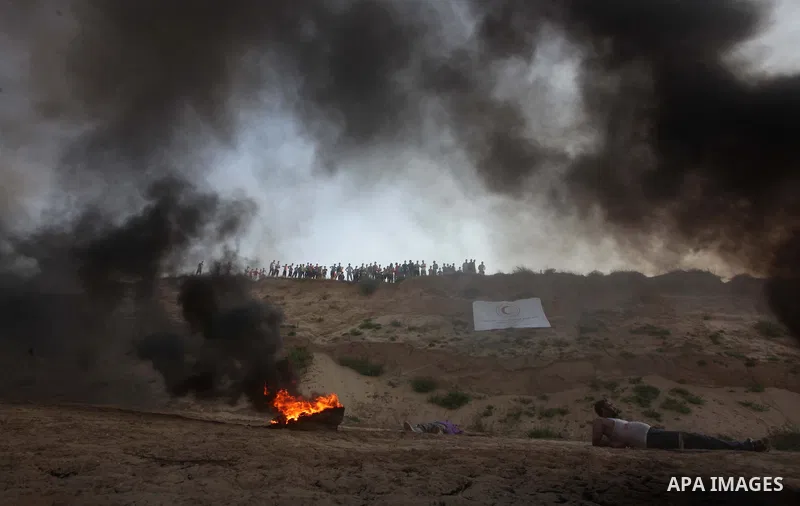 During a drill, Palestinian medics attend to a 'victim' of an explosion as part of an exercise of a graduation ceremony of medics, in Mughraqa, central Gaza Strip, Thursday, Sept. 5, 2013. Medics from the Palestine Red C...