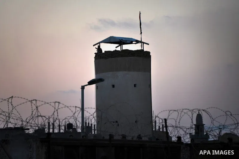 An Egyptian soldier stands guard on the border between Egypt and Gaza Strip, in Rafah town southern Gaza Strip, on September 13, 2013. Egyptian security forces have stepped up a crackdown campaign on smuggling tunnels be...