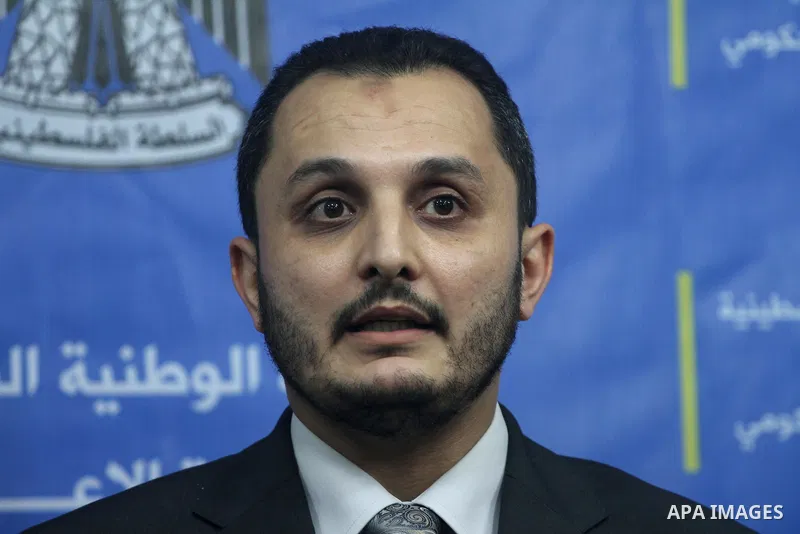 Spokesman of Palestinian government in Gaza Strip Ihab al-Ghussein speaks during a press conference, in Gaza City, Sept. 15, 2013. al-Ghussein dismissed the claims of authorities in Cairo and Egyptian media of interferin...