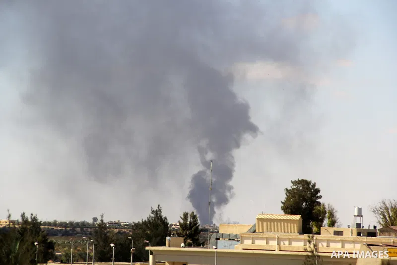 Smoke is rising at the border between Gaza Strip and Egypt, Sept. 17, 213. Cairo closed the Rafah crossing, Gaza's main window to the world, completely last week after assailants crashed two explosive-laden cars into a s...