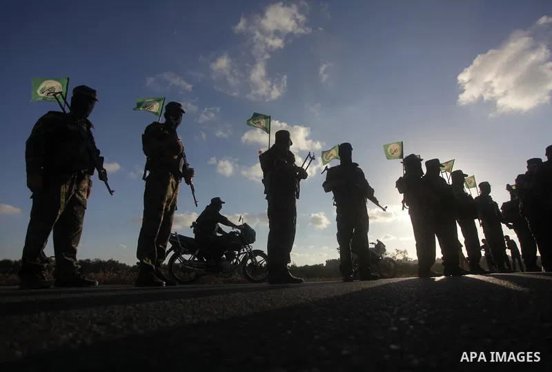 Palestinians Hamas militants take part in a protest against peace talks between Israel and the Palestinians, at Al Nusairat refugee camp in central Gaza Strip September 20, 2013. Photo by Ashraf Amra