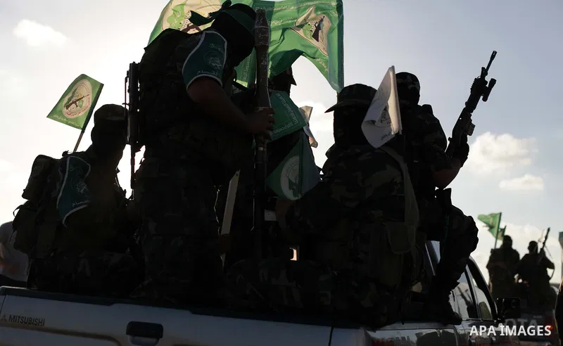 Palestinians Hamas militants take part in a protest against peace talks between Israel and the Palestinians, at Al Nusairat refugee camp in central Gaza Strip September 20, 2013. Photo by Ashraf Amra