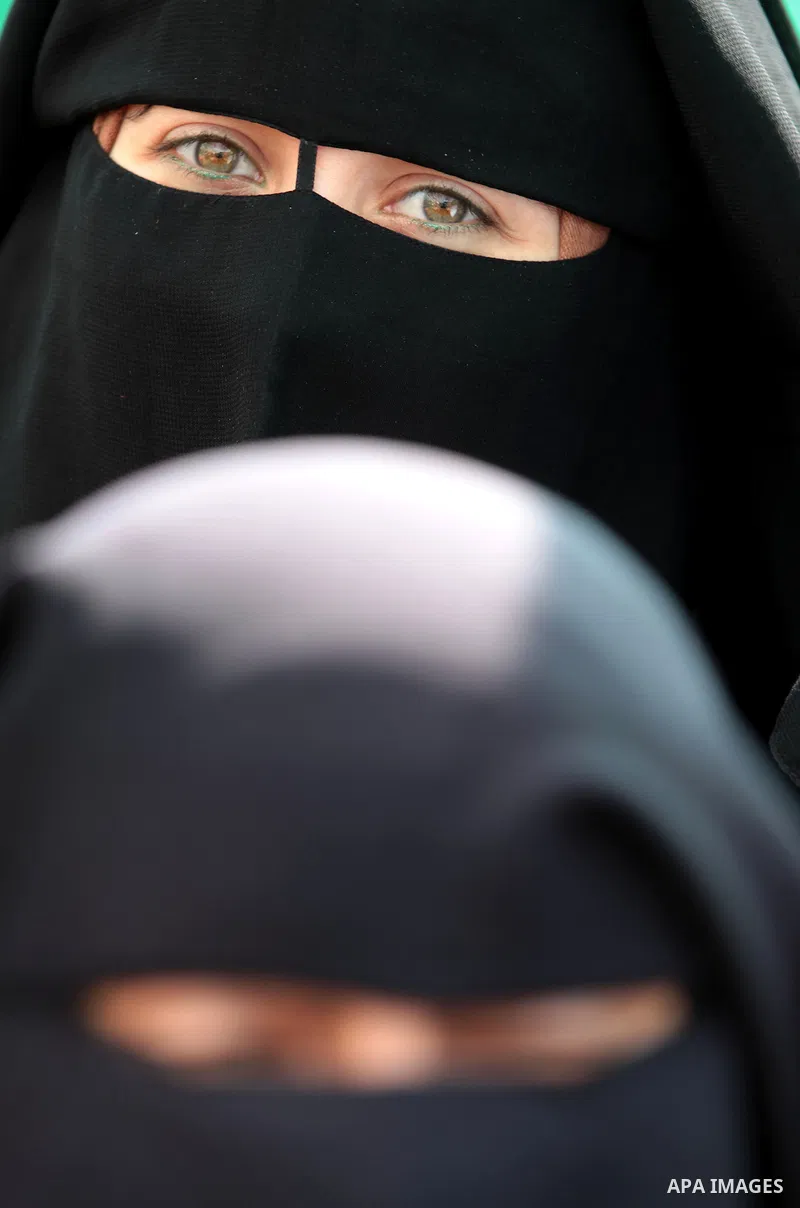 Palestinian women shout slogans during a protest organised by the Hamas movement in Gaza City on September 24, 2013, amid recent tensions among Palestinians regarding Israel's admittance of visitors to a holy site in Jer...