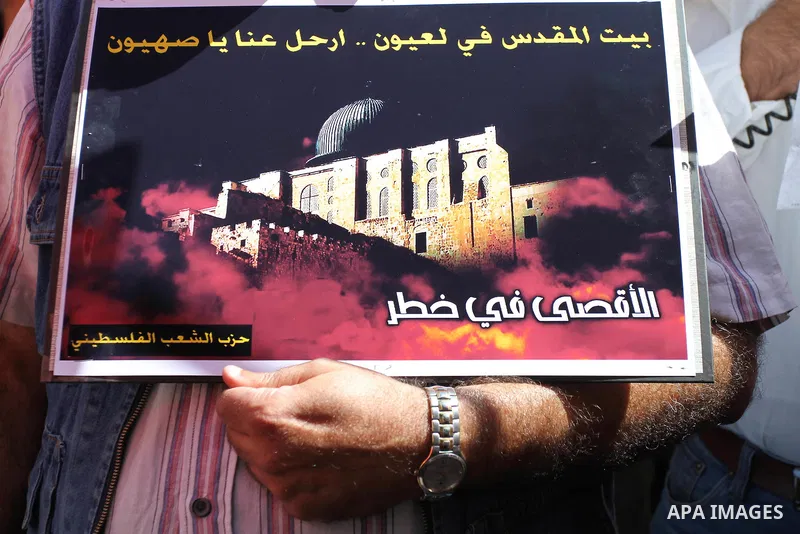 Palestinians shout slogans during a protest to calling for the release of Palestinian prisoners from Israeli jails in the West Bank City of Nablus, on Sep. 25, 2013. Photo by Nedal Eshtayah