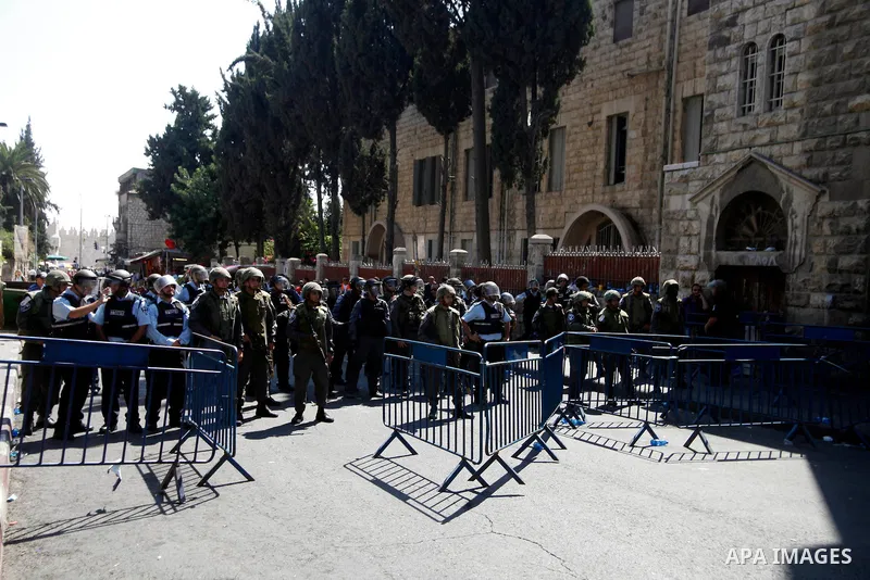 Israeli security forces take position during clashes with Palestinian protesters in Jerusalem on September 27, 2013. According to the Israeli police spokesman 10 Palestians were arrested for stone throwing at the Jerusal...
