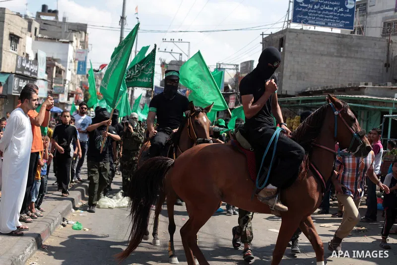 Palestinian Hamas supporters take part in a protest to show solidarity with Al-Aqsa mosque after Friday prayers in the central Gaza Strip September 27, 2013. Israeli police clashed with Palestinian protesters in Jerusale...