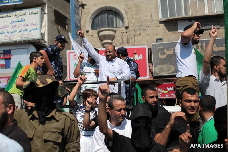 Palestinian Hamas supporters take part in a protest to show solidarity with Al-Aqsa mosque after Friday prayers in the central Gaza Strip September 27, 2013. Israeli police clashed with Palestinian protesters in Jerusale...