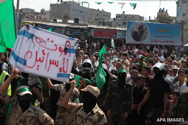 Palestinian Hamas supporters take part in a protest to show solidarity with Al-Aqsa mosque after Friday prayers in the central Gaza Strip September 27, 2013. Israeli police clashed with Palestinian protesters in Jerusale...