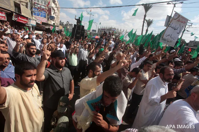 Palestinian Hamas supporters take part in a protest to show solidarity with Al-Aqsa mosque after Friday prayers in the central Gaza Strip September 27, 2013. Israeli police clashed with Palestinian protesters in Jerusale...