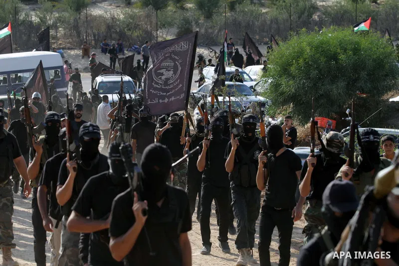 Palestinian militants from Al Nasser Brigades, an armed wing of the Popular Resistance Committees (PRC), take part in a training session in Khan Younis, southern Gaza Strip, Friday, Sept. 27, 2013. Photo by Ashraf Amra