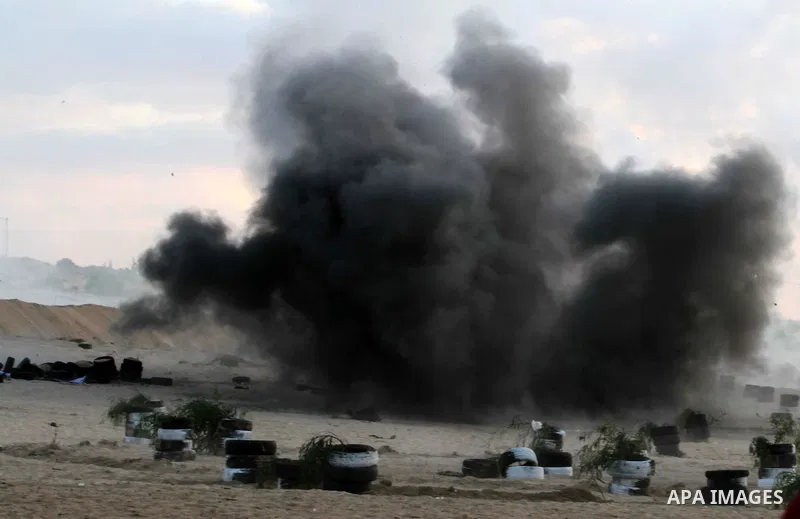Palestinian militants from Al Nasser Brigades, an armed wing of the Popular Resistance Committees (PRC), take part in a training session in Khan Younis, southern Gaza Strip, Friday, Sept. 27, 2013. Photo by Ashraf Amra