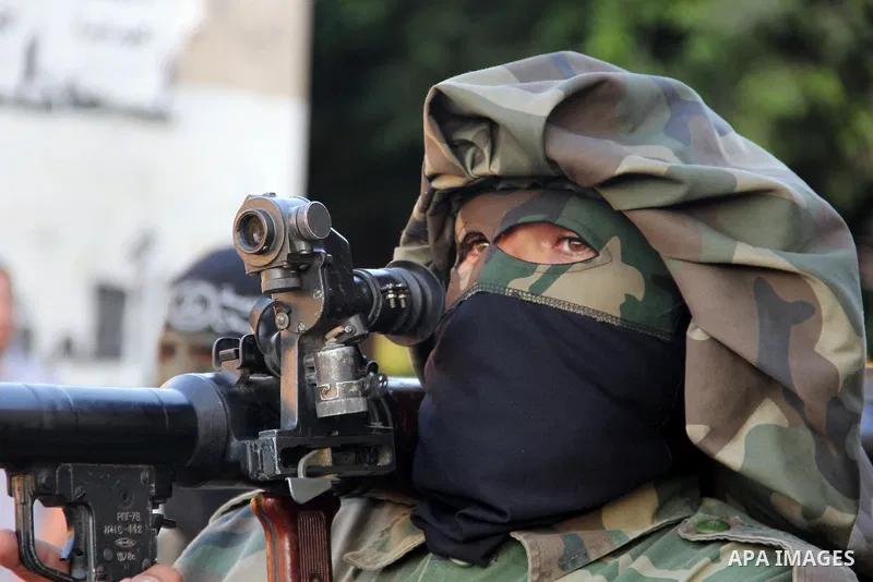 Palestinian militants from Al Nasser Brigades, an armed wing of the Popular Resistance Committees (PRC), take part in a training session in Gaza City, Sept. 28, 2013. Photo by Mosad al-Mahmuom