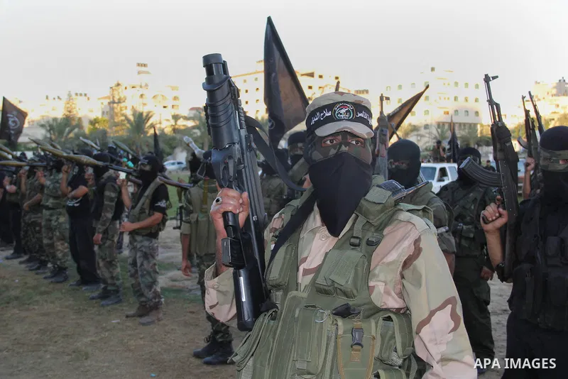 Palestinian militants from Al Nasser Brigades, an armed wing of the Popular Resistance Committees (PRC), take part in a training session in Gaza City, Sept. 28, 2013. Photo by Mosad al-Mahmuom